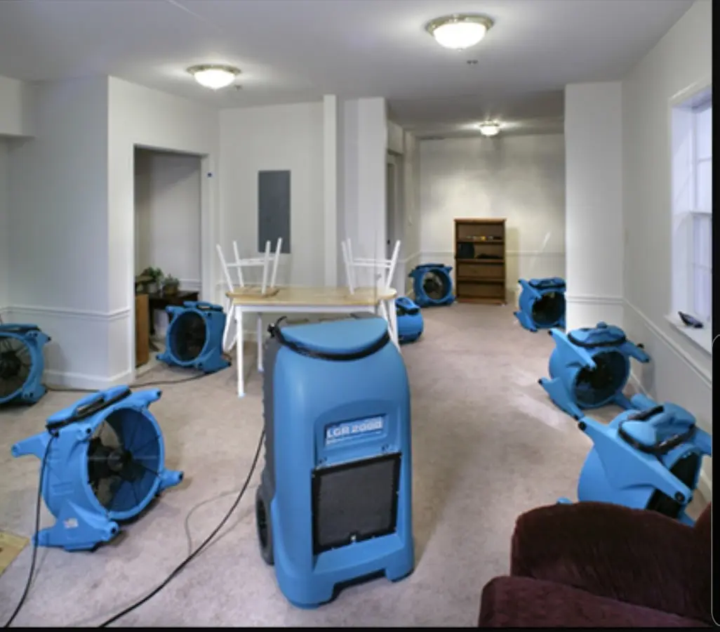 Air movers and dehumidifier setup for Water Extraction & Removal in Covington